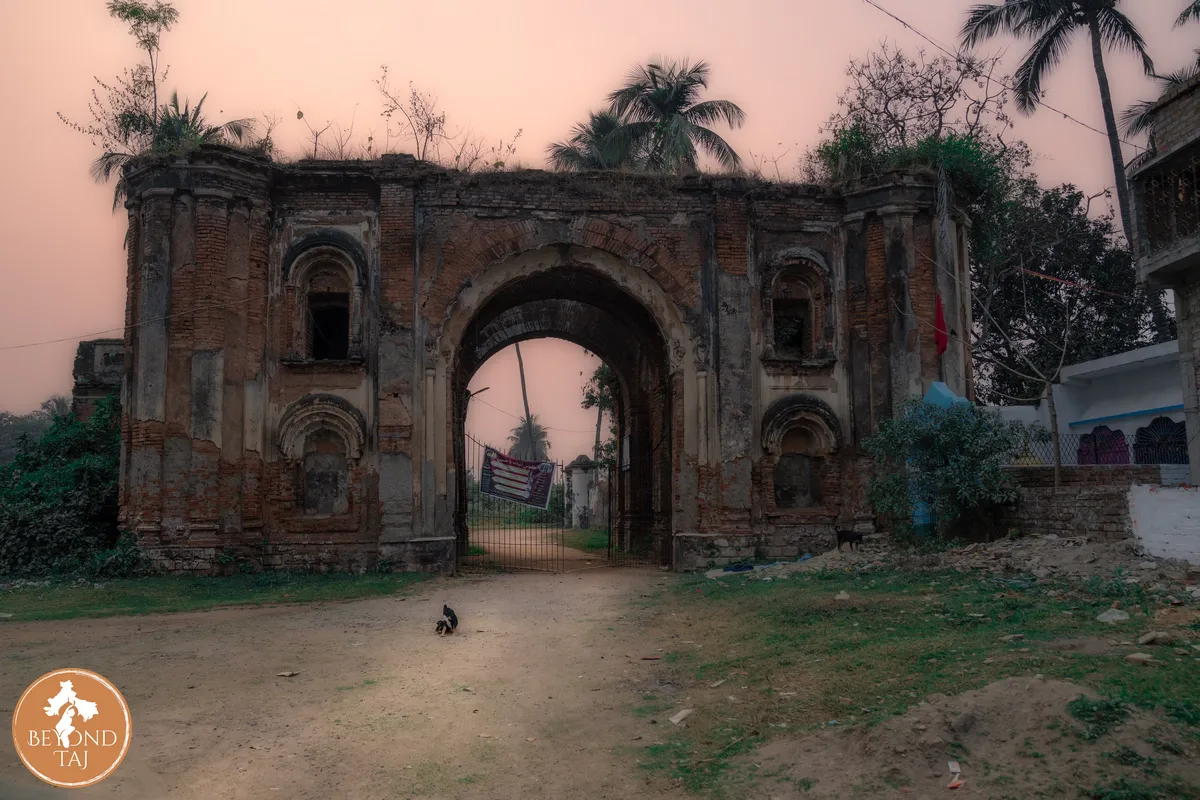 weathered entry gate to an old mosque in murshidabad